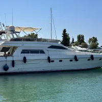 Aegean Getaways elegant interior cabin with comfortable sleeping accommodations