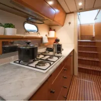 Aegean Getaways outdoor dining area on deck overlooking the Aegean Sea