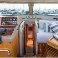 Aegean Getaways guest cabin with double bed and storage